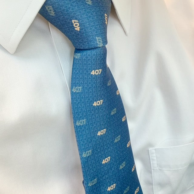 Blue necktie with 407 graphics.